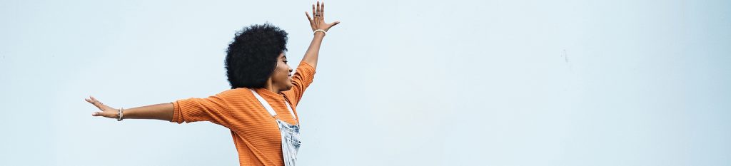Young Stylish Afro Woman Jumping